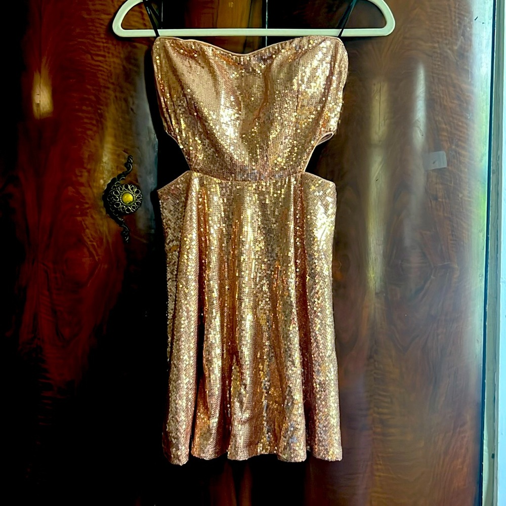 Strapless Rose gold sequins mini dress with side cutouts